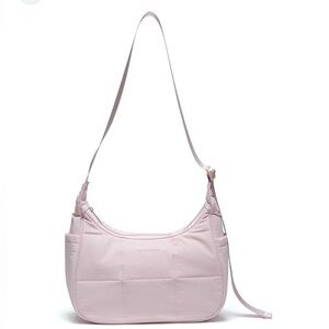 Light pink Pander Design quilted crescent shoulder bag